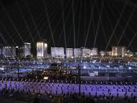 Performers dressed in ancient Egyptian costume wait at the start of the parade of 22 ancient Egyptian royal mummies 