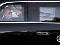 US president Joe Biden waves as he leaves for the airport after his press conference at the end of the US-Russia summit in Geneva 