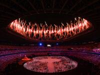 Fireworks go off around the Olympic Stadium during the opening ceremony of the Tokyo 2020 Olympic Games, in Tokyo