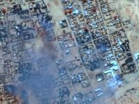 This handout image courtesy of Maxar Technologies released on April 17, 2025, shows smoke billowing and burned buildings in the Zamzam camp near the besieged Darfur city of Al Fashir. Photo by - / SATELLITE IMAGE ©2025 MAXAR TECHNOLOGIES / AFP Al Fashir city