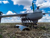 Ukrainian soldier uses a drone in Donbass