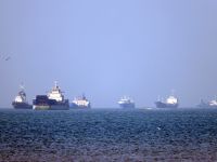 In this picture obtained from Iran's ISNA news agency on May 4, 2026, vessels are pictured anchored in the Strait of Hormuz off Bandar Abbas in southern Iran. Photo by AMIRHOSSEIN KHORGOOEI / ISNA / AFP