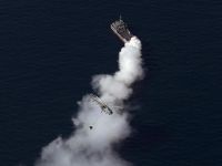 Crew rescued after sanctioned tanker catches fire in suspected attack off Oman
