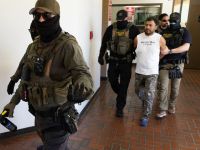 ICE agents conducting an arrest