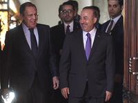 Russian Foreign Minister Sergei Lavrov (L) and his Turkish counterpart Mevlut Cavusoglu enter a hall during a meeting in Moscow on April 28, 2018. Alexander NEMENOV / AFP