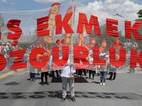 Demonstrators take part in a May Day rally in Ankara, on May 1, 2018 / AFP