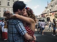 A couple kiss as they celebrate after France won the Russia 2018 World Cup final football match between France and Croatia, outside the "Le Carillon" bar in Paris on July 15, 2018, where the attacks of November 2015 took place.
Lucas BARIOULET / AFP