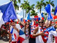 People celebrate in the streets of Cayenne, in French Guiana, on July 15, 2018, after France won the Russia 2018 World Cup final football match between France and Croatia. 
Jody AMIET / AFP