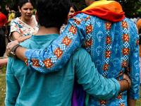 Indian members of the lesbian, gay, bisexual, transgender (LGBT) community pose for a picture outside the Supreme Court after the decision to strike down the colonial-era ban on gay sex in New Delhi on September 6, 2018. 
CHANDAN KHANNA / AFP
