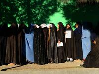 Afghan women wait in line to vote at a polling centre for the country's legislative election in Herat province on October 20, 2018.
HOSHANG HASHIMI / AFP