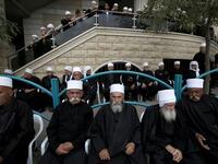 Druze men sit in the village of Majdal Shams in the Israeli-annexed Golan Heights. (JALAA MAREY / AFP)