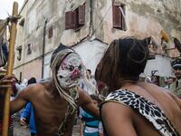 Young Moroccans take part in the Boujloud festival, a popular celebration also known as the 'Moroccan Halloween' in the Sidi Moussa district of Sale near Rabat, on October 27, 2018. 
FADEL SENNA / AFP