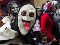 Young Moroccans take part in the Boujloud festival, a popular celebration also known as the 'Moroccan Halloween' in the Sidi Moussa district of Sale near Rabat, on October 27, 2018. 
FADEL SENNA / AFP