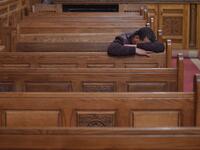 A Coptic Christian man mourns victims killed in an attack a day earlier, during an early morning ceremony at the Prince Tadros church in Egypt's southern Minya province, on November 3, 2018. 
MOHAMED EL-SHAHED / AFP
