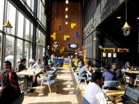 Iraqis sit at "The Station", Baghdad's incubator for would-be entrepreneurs, in the Iraqi capital on November 17, 2018. 
SABAH ARAR / AFP