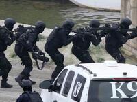 Members fo the UAE Armed forces perform a military drill during the opening of the International Defence Exhibtion and Confrence at the Abu Dhabi National Exhibtion Centre on February 17, 2019. 
AFP