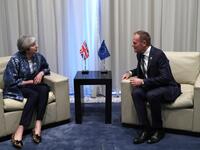 President of the European Council Donald Tusk speaks with British Prime Minister Theresa May during a bilateral meeting on February 24, 2019, on the sidelines of the first joint European Union and Arab League summit in the Egyptian Red Sea resort of Sharm el-Sheikh. 
Francisco Seco / POOL / AFP