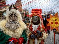 Performers in scary masks entertain the public during the Shrovetide spring festival outside the Kremlin in Moscow on March 01, 2019. Mladen ANTONOV / AFP