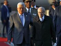 Tunisian President Beji Caid Essebsi (R) welcomes his Palestinian counterpart Mahmoud Abbas upon his arrival at Tunis-Carthage international airport on March 30, 2019, to attend the Arab Summit tomorrow. 
Hussein Malla / POOL / AFP