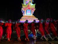 Traditional dancers perform during abbot Kay Lar Tha's funeral procession in Mudon, Mon State. 
Ye Aung THU / AFP