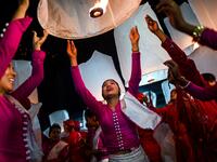 In this picture devotees release lanterns near a makeshift palace during abbot Kay Lar Tha's funeral in Mudon, Mon State. 
Ye Aung THU / AFP