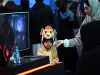 A Saudi child dressed as Simba from Disney's 1994 animated "The Lion King" film attends the first ever Comic-Con Arabia event held in the capital Riyadh on November 25, 2017. 
(FAYEZ NURELDINE / AFP)