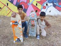 Young skates: Ahmad, age 15 and his little brother Mohammad, age 8 (Facebook)