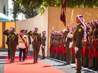Jordan's King Abdullah II salutes the honour guard upon his arrival at parliament, for the third regular session session in the capital Amman on October 14, 2018. (Faceook/ @RHCJO)