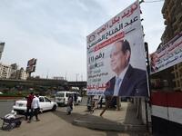 Sisi election banners looking forward to three-day poll between 26-28 March, 2018 (AFP/File Photo).