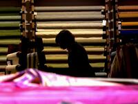 This picture  shows a woman at work in the laboratory of Antico setificio Fiorentino ancient silk factory in Florence. 
Tiziana FABI / AFP