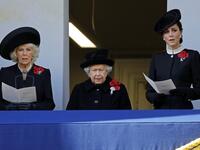 Britain's Camilla, Duchess of Cornwall (L), Britain's Queen Elizabeth II (C) and Britain's Catherine, Duchess of Cambridge (R) attend the Remembrance Sunday ceremony at the Cenotaph on Whitehall in central London, on November 11, 2018. 
Tolga AKMEN / AFP