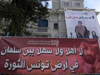 This picture taken on November 26, 2018 shows a banner hanging outside Tunisia's Journalists Union in the capital Tunis depicting Saudi Crown Prince Mohammed bin Salman with a caption reading in Arabic "no welcomes to bin Salman in Tunisia. 
FETHI BELAID / AFP