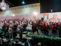 Dancers dressed in traditional Palestinian clothing perform during a mass wedding ceremony for 150 Palestinian couples and 50 other Lebanese couples
Mahmoud ZAYYAT / AFP