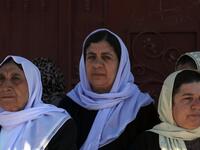 Iraqi Yazidi women attend the funeral of the Mir Takhsin-Beg (Tahseen Said Ali), the hereditary leader of the Yazidi community in the world, during his funeral in the town of Sheikhan, 50km northeast of Mosul. 
SAFIN HAMED / AFP