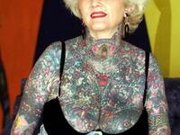 Briton Isobel Varley, 69, the world’s eldest tattooed woman according to the Guinness Book of Records, poses at a hotel in Buenos Aires, July 7, 2005. (AFP/ File Photo)