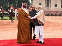 India's President Ram Nath Kovind (C) looks on as Saudi Crown Prince Mohammed bin Salman (L) and India's Prime Minister Narendra Modi shake hands during a ceremonial reception at the presidential palace in New Delhi  (Twitter)