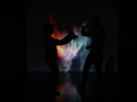 Two boys wave their arms to create spiritual-like expressions of their movement with light. An exploration project of the digital and physical by Jordanian multidisciplinary visual artist Andrei Snobar. (Al Bawaba/Salim Essaid) 