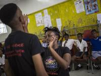"Empowerment through Self-defence for women and girls" which aims to create a world free form fear of gender based violence. (GULSHAN KHAN / AFP)