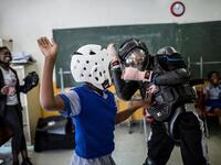 Girls are taught how to defend themselves physically but also how to identify and respond to potentially dangerous situations. (AFP/File)