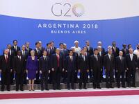 Participants of the G20 Leaders' Summit in Buenos Aires, pose for a family photo on November 30, 2018. Global leaders gather in the Argentine capital for a two-day G20 summit beginning on Friday likely to be dominated by simmering international tensions over trade.
SAUL LOEB / AFP