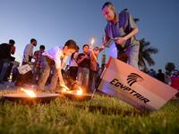 Egyptians gather at a candle light vigil for the victims of the EgyptAir plane crash that killed all 66 people on board when it went down in the Mediterranean. 