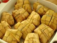 Philippines feast on "ketupat" - a food item served in most households during Eid.  It is a staple food made from rice, wrapped by coconut leaves, similar to the common 'sambusak' concept enjoyed in the Middle East and beyond. Ketupat or kupat also can be found in Malaysia, Brunei Darussalam, Indonesia and Singapore.