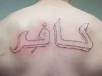 ‘Kafir’: Most commonly translated as ‘disbeliever,’ this occaisionally offensive word is used to describe someone who has rejected Islam. It also has ties to apartheid in South Africa. Either way, you wouldn't want to be sporting this tattoo if Daesh were to ever get their hands on you.