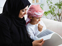 mother child studying Arab