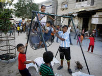 arab kids playing playground