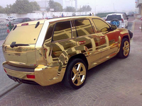 Gold SUV (eshowbizbuzz)
