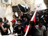 Iraqi protestors carry the coffin of a man on September 4, 2018, that family and Human rights activists claim was killed by bullet shots during the previous day, while demonstrating against the government and the lack of basic services, in the southern city of Basra.
Haidar MOHAMMED ALI / AFP