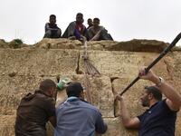 Experts and students from Algiers University’s Archaeology Institute work on one of the Jeddars pyramid tombs, near the city of Tiaret.
RYAD KRAMDI / AFP