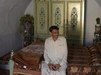 Pakistani villager Ameer Ullah Khan sits in his cave room in Nikko village, about 60 kilometres from the capital Islamabad.
AAMIR QURESHI / AFP