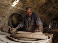 Iraqis making clay pots in Najaf on November 11, 2018. Pottery has deep roots in Iraq, where ancient civilisations turned to clay to build their homes, shape their cooking utensils, and even make their ovens.
Haidar HAMDANI / AFP